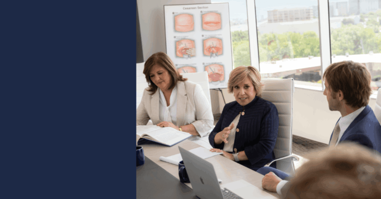 Kay and Team in Conference Room